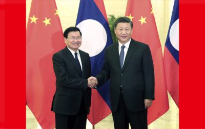 习近平会见老挝总理通伦